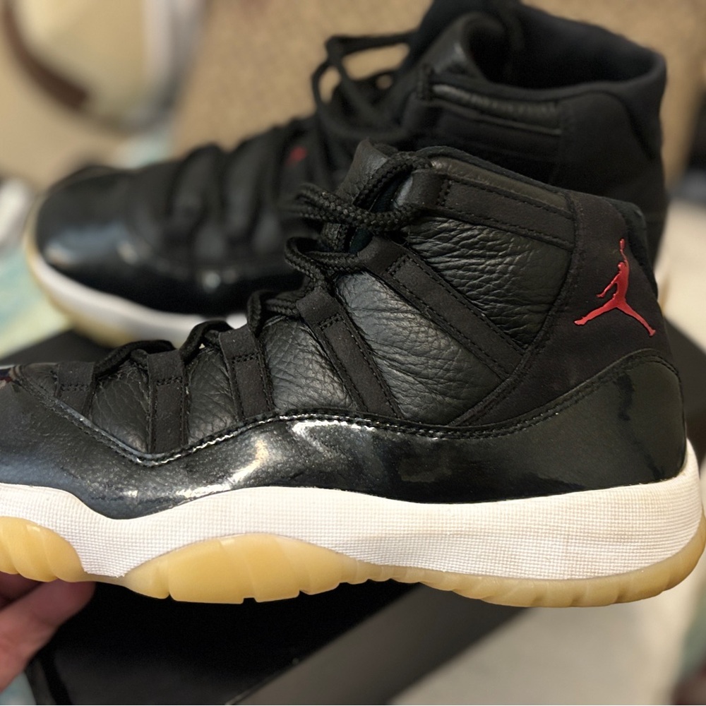 Jordan 11’s mid 72-10 Black and Red with Gum soles.